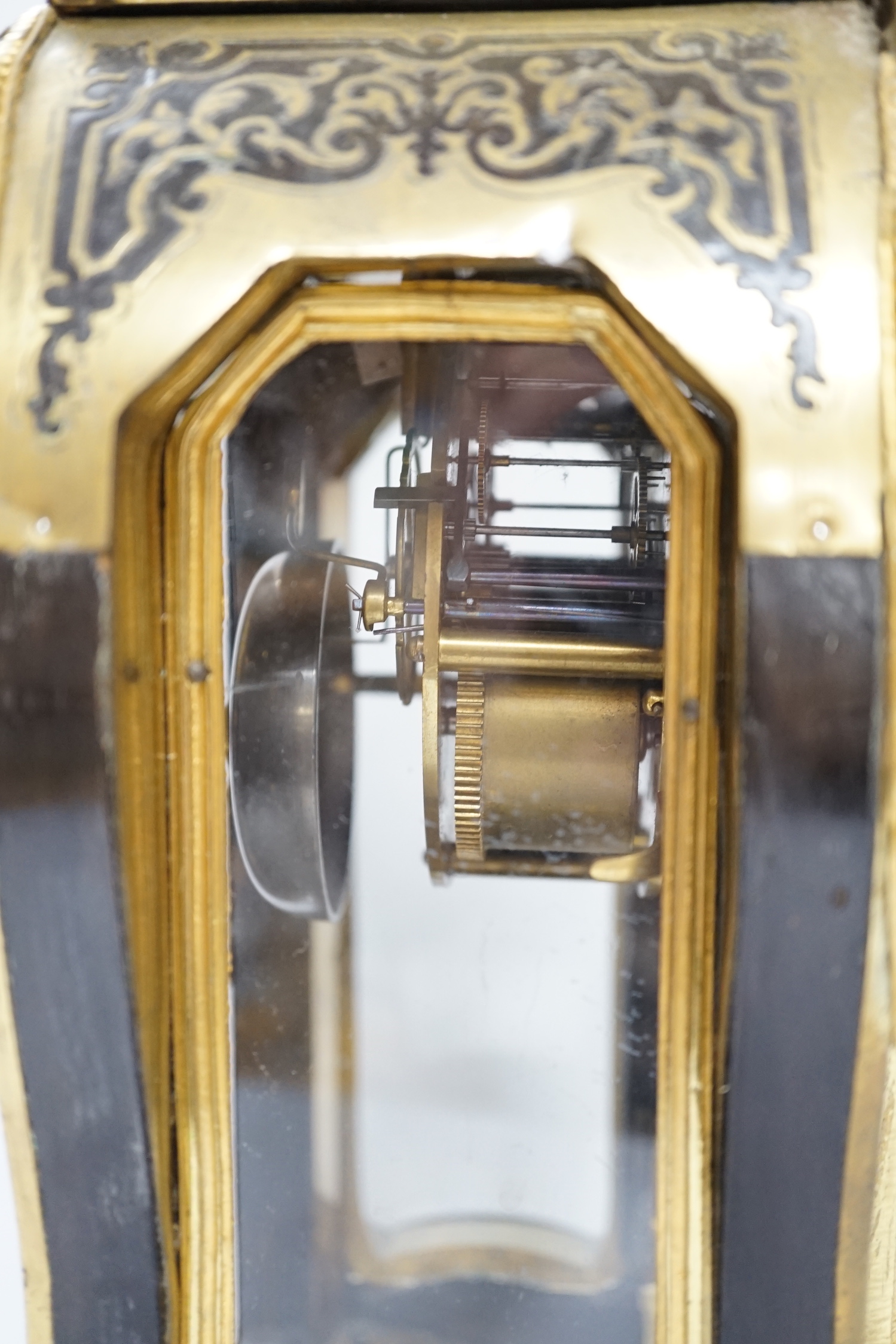 A large Louis XV style cut brass inlaid mantel clock, with a two train, French movement, striking on a bell, 50cm high